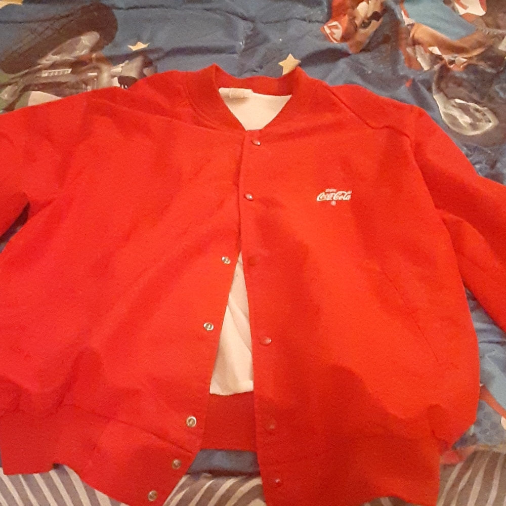 I'm selling a coca cola long sleeve bomber jacket